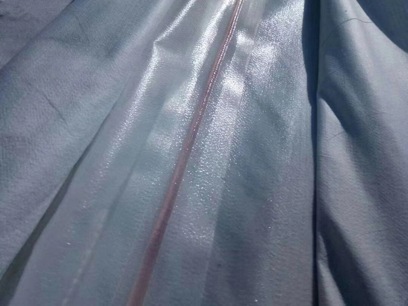 369.50m高程的壩體選擇什么規(guī)格的復(fù)合土工膜合適？